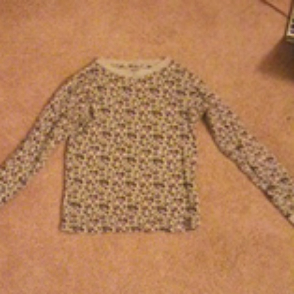 A gray,black,and purple long sleeve shirt.
